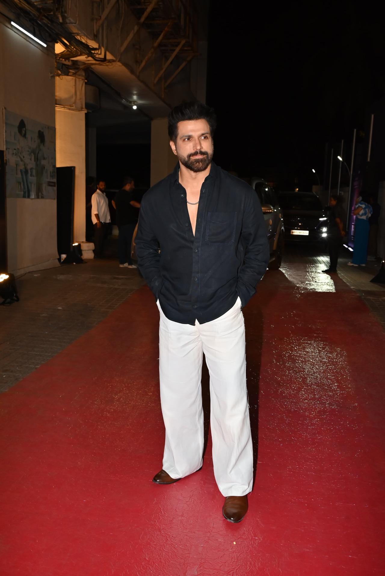 Actor Ritwik Dhanjani was seen in a black shirt and white pants as he arrived to watch the film at its special screening