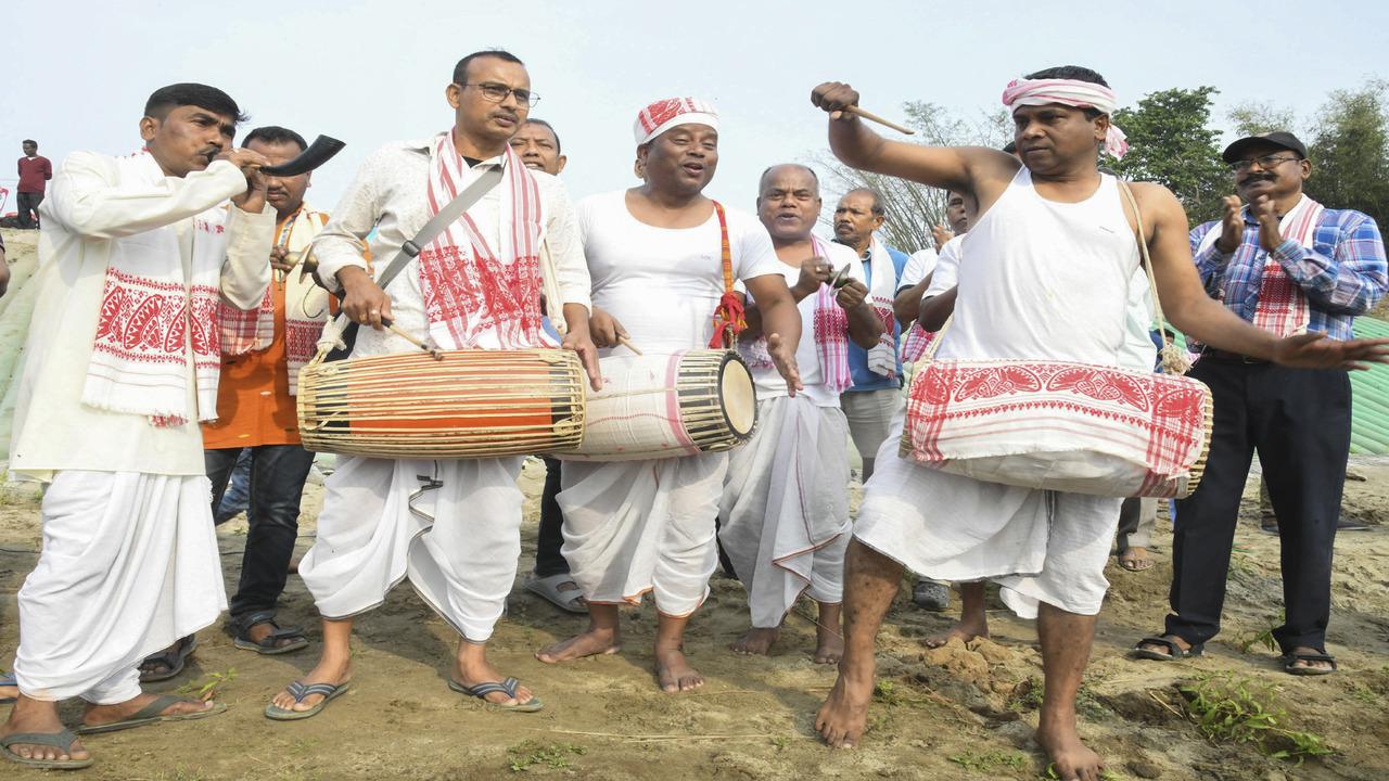 People participate in Rongali Bihu celebrations, in Tezpur, Assam on Monday, April 14 (PTI Photo)