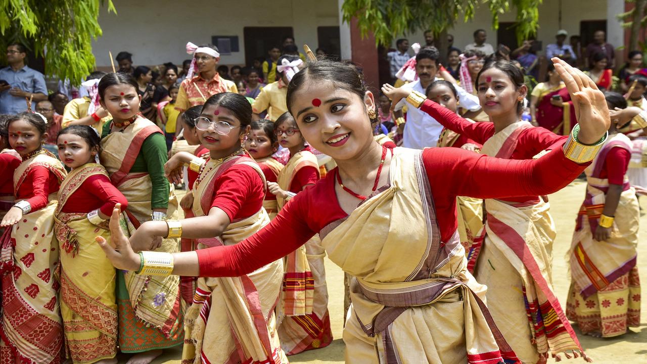 Earlier, ahead of Rongali Bihu or Bohag Bihu as it is more popularly known, students of Assom Jatiya Vidyalaya perform Bihu dance during the celebration of Rongali Bihu at Noonmati in Guwahati, Saturday, April 12 (PTI Photo)