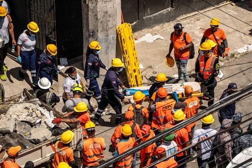 The son of the Dominican Republic’s public works minister and his wife remain missing, as confirmed by local authorities. The president of the Dominican Association of Engineers, Architects and Surveyors cited ageing infrastructure and past fire damage as possible contributing factors to the structural failure.