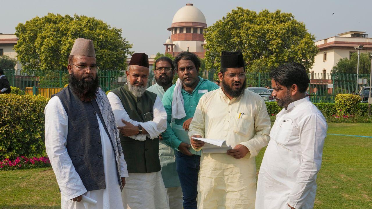 Petitioners from Bareilly's Dargah Ala Hazrat and Darbhanga's Samvidhan Bachao group outside the Supreme Court in Delhi on Wednesday. Pic/PTI