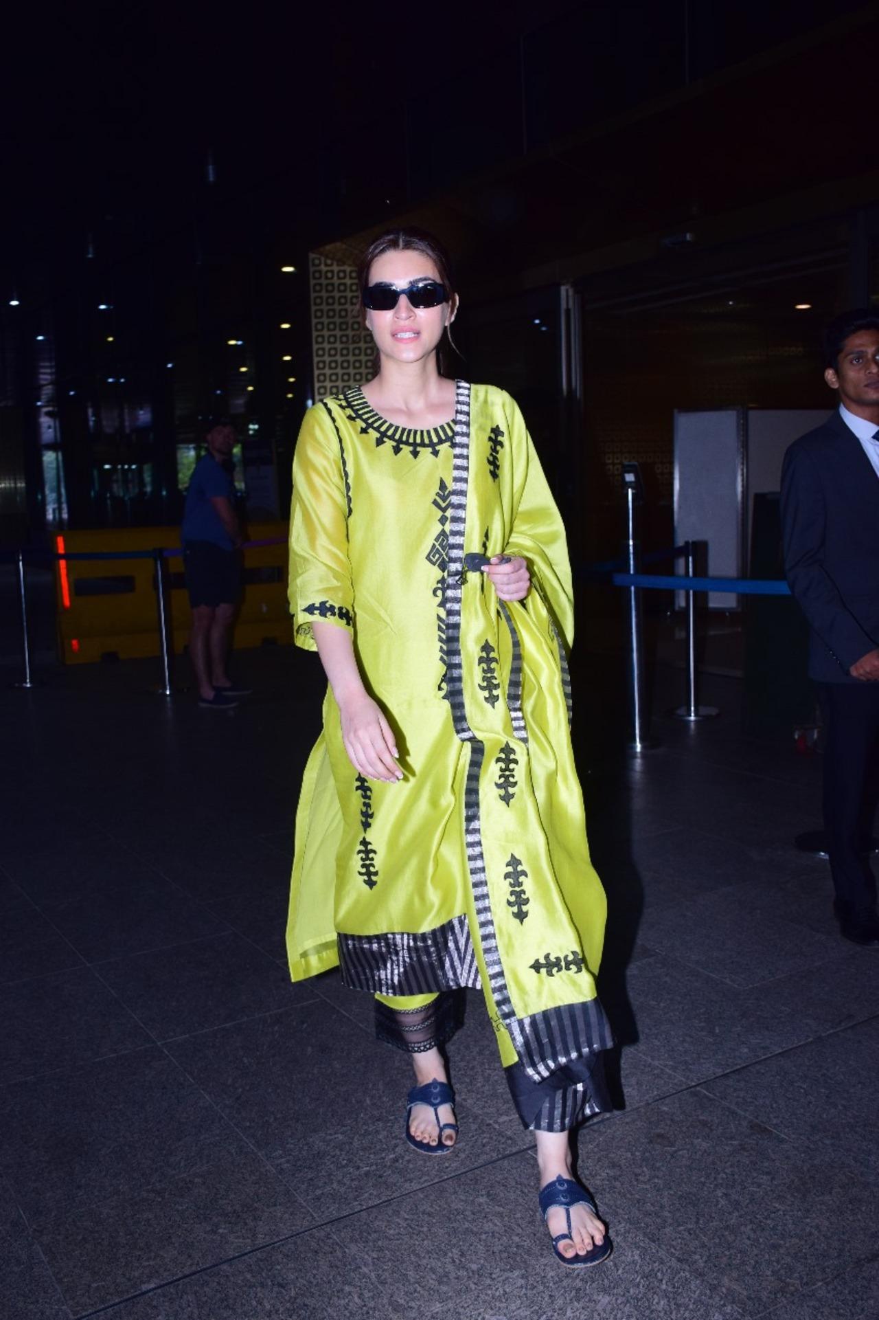 Kriti Sanon exuded desi summer vibes in this bright yellow salwar suit at the airport. 