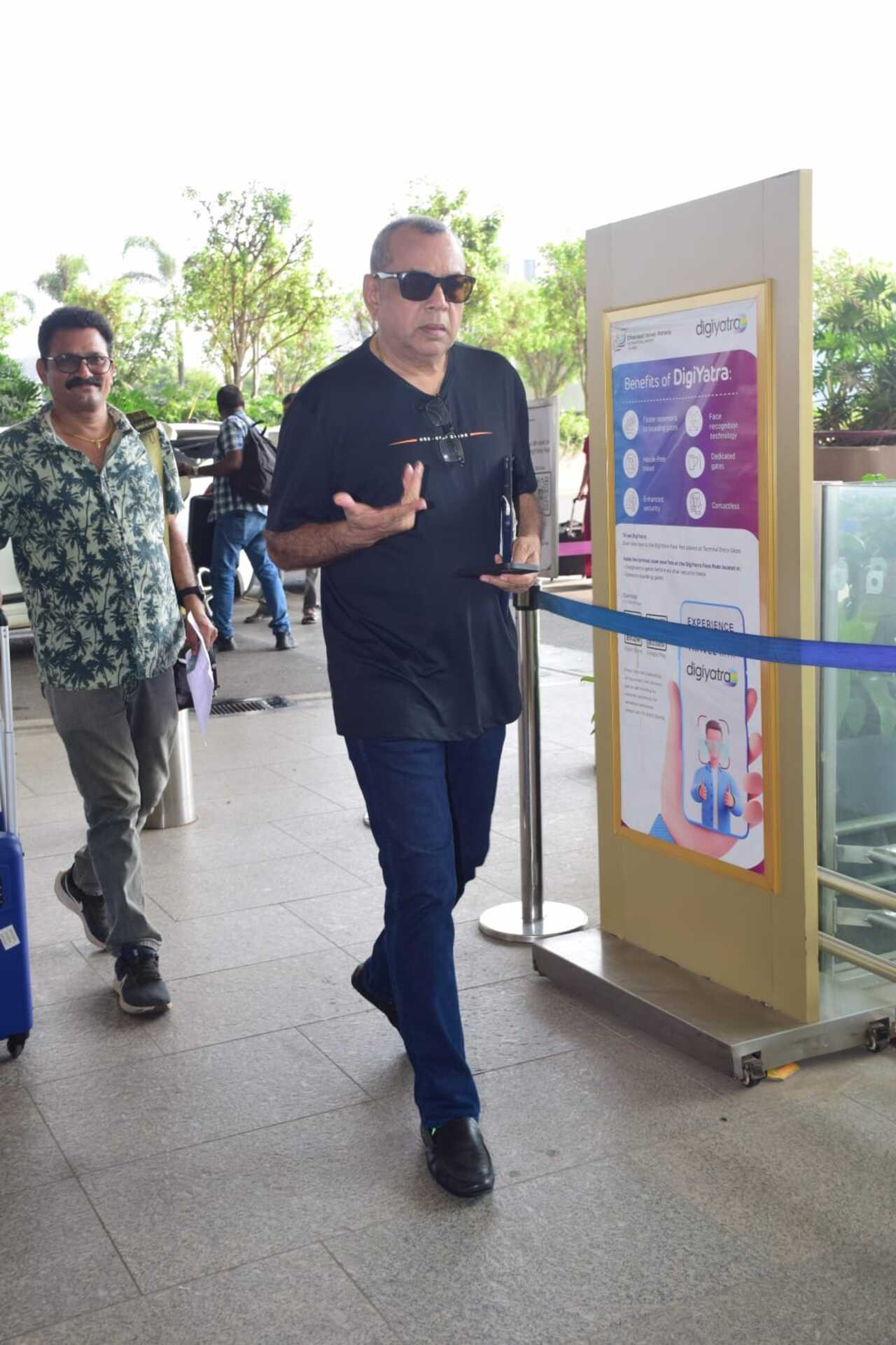 Paresh Rawal was seen making a rare paparazzi appearance at the airport