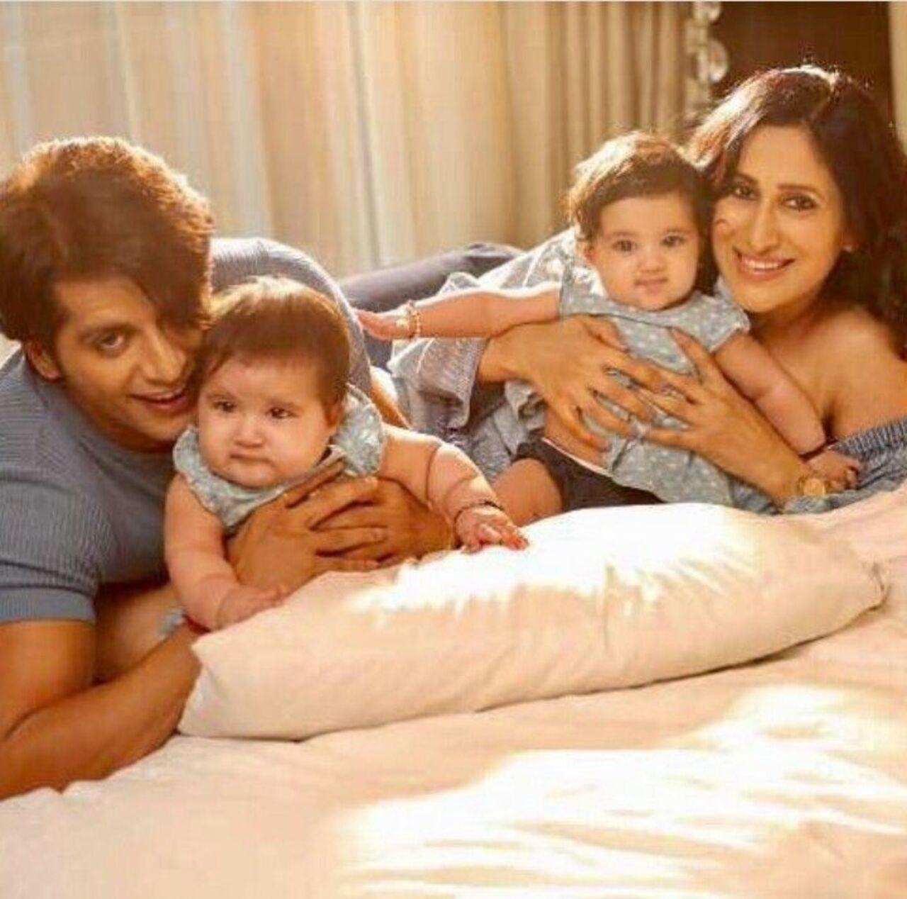 Enjoying squishy cuddles on a lazy day, the family seems to be making the most of the golden sunrays by creating the picture perect moments.