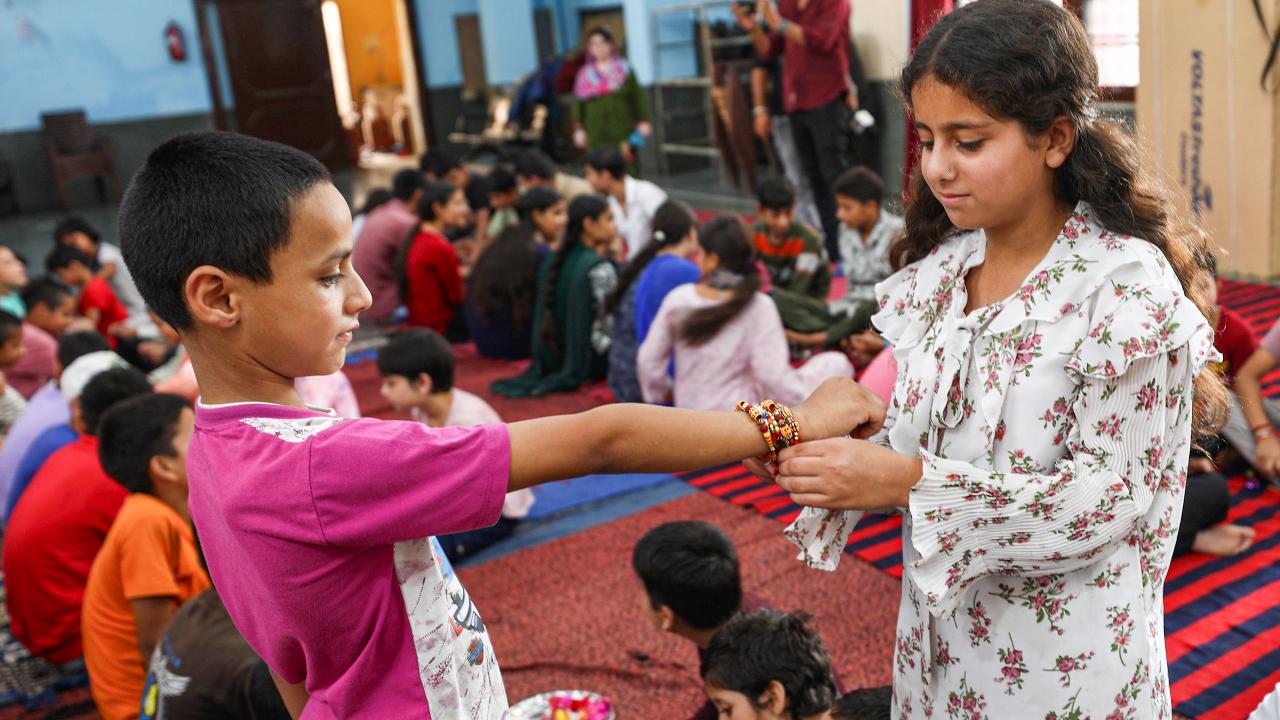 At an orphanage in Jammu, children tied rakhis on each other's wrists, deepening the meaning of the festival and reaffirming that the bond of protection and care extends beyond blood relations