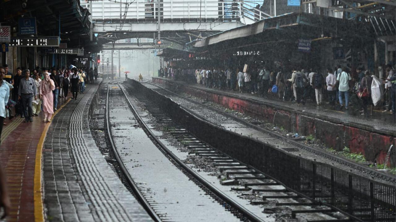 Heavy monsoon showers also left Dadar railway station waterlogged, stranding passengers early in the morning