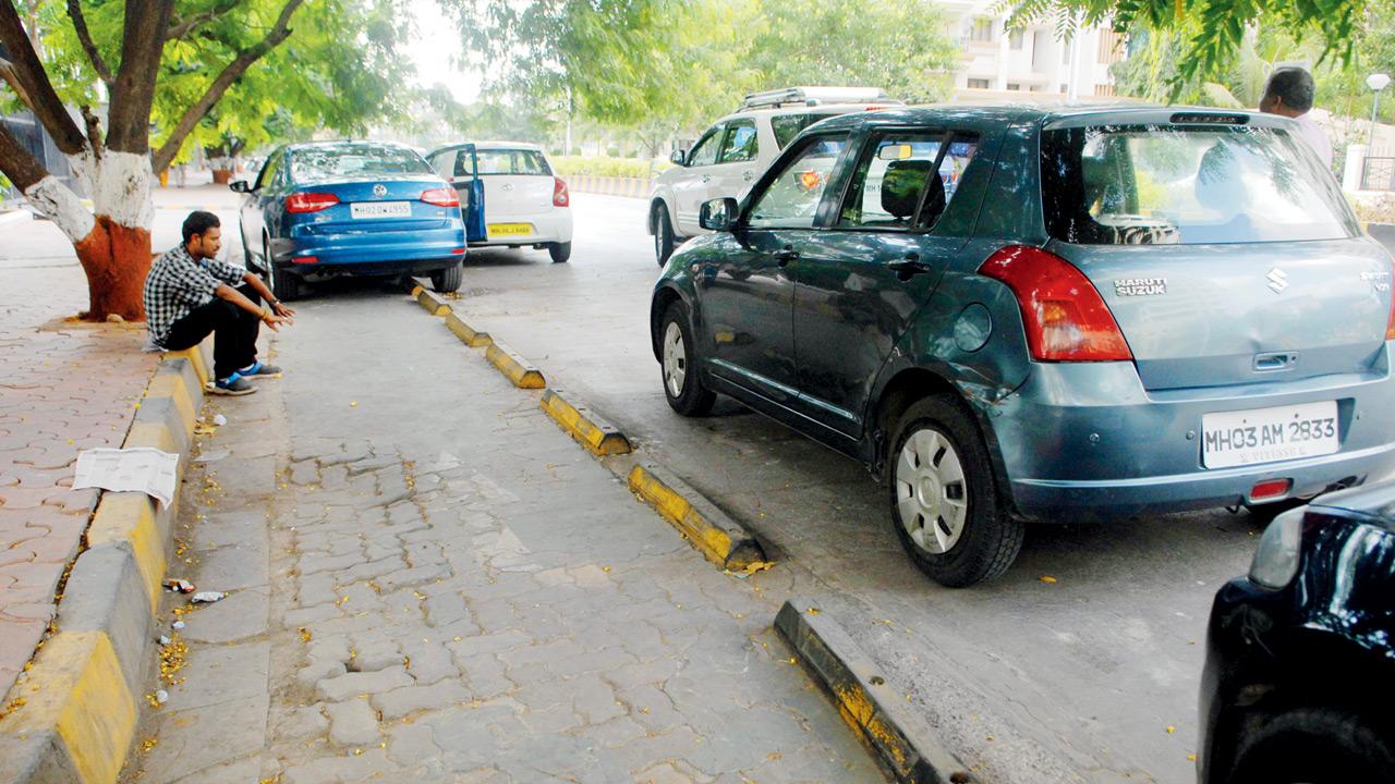 Car is illegally parked on a cycling track at BKC on June 2, 2015. FILE PIC