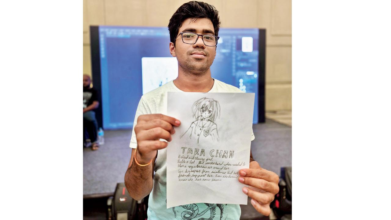 A participant holds up a character sketch from a workshop