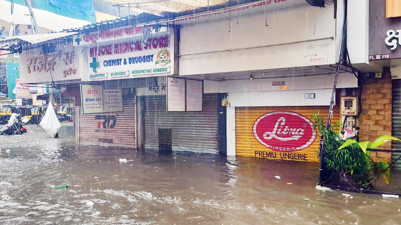 Dombivli flooded after morning deluge; station, shops hit, commuters stranded
