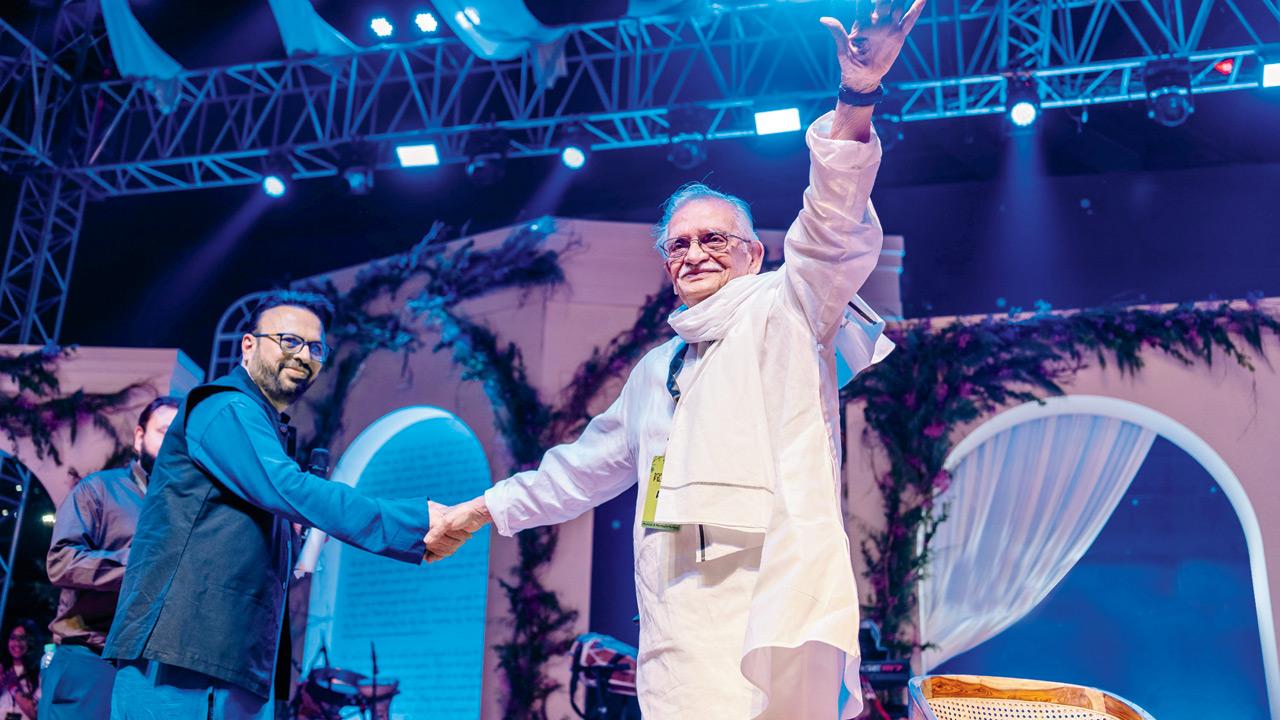 Roshan Abbas (left) greets lyricist Gulzar at the recently concluded edition of the fest in Pune. Pic Courtesy/@freelenser_