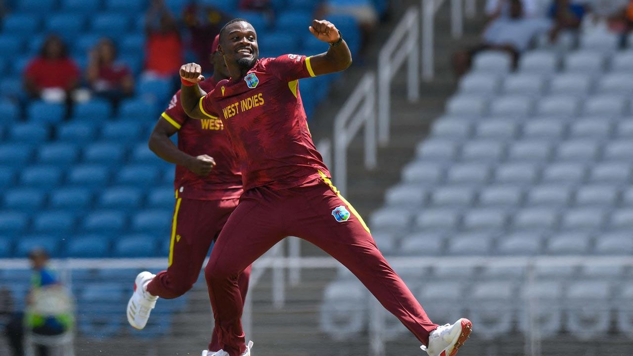 Jayden Seales of West Indies celebrates the dismissal of Abdullah Shafique of Pakistan during the 3rd and final ODI match between West Indies and Pakistan at Brian Lara Cricket Academy in Tarouba, Trinidad and Tobago