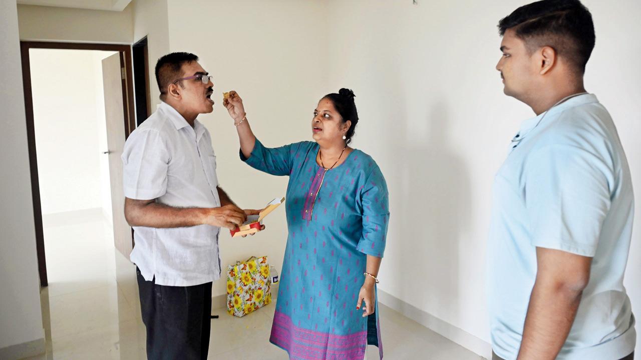 The Kale family after performing a puja in their new apartment