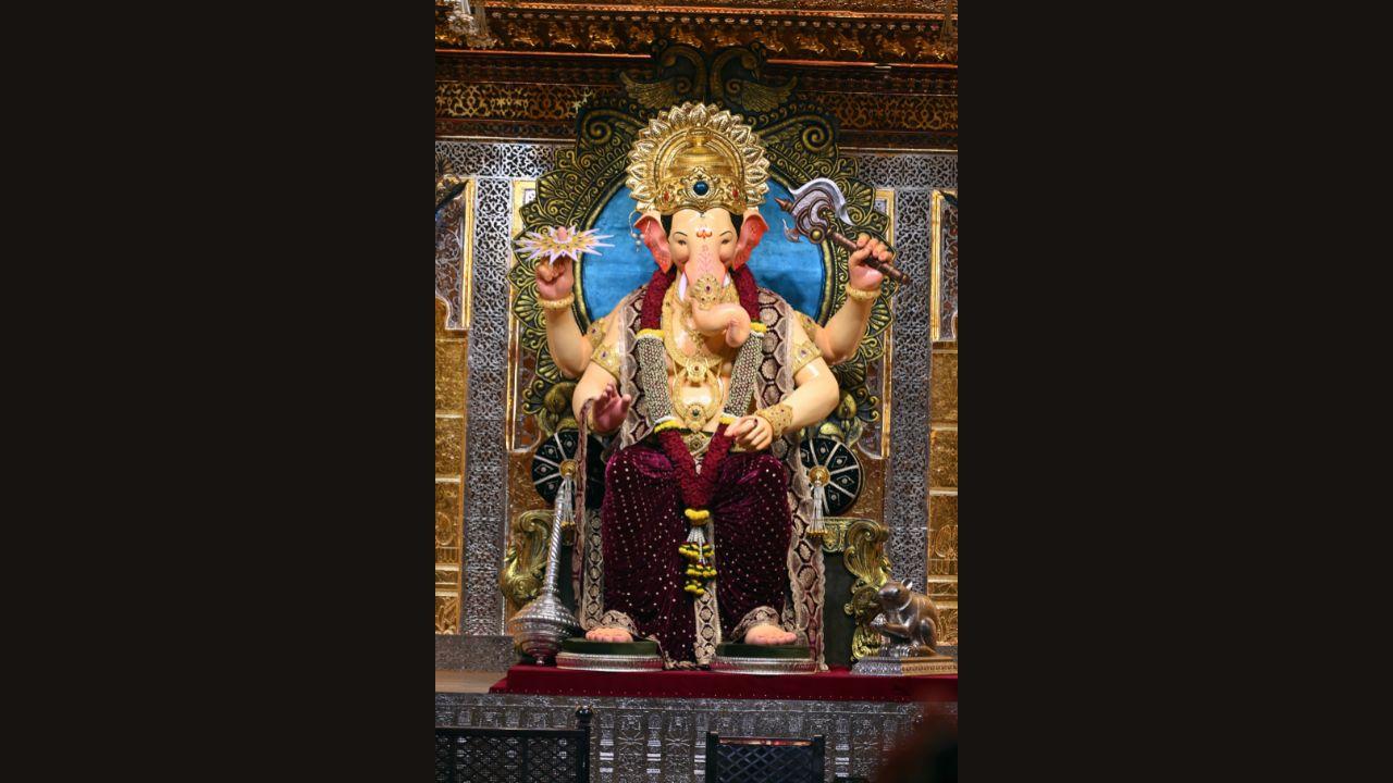 The 22-foot idol, with his trademark posture and gentle smile, remains a source of comfort, joy, and pride for the city. In him, Mumbai sees not just a deity, but a friend, a guardian, and a reminder that amidst the city’s chaos, there is always a place for devotion, unity, and hope. (Year: 2024)