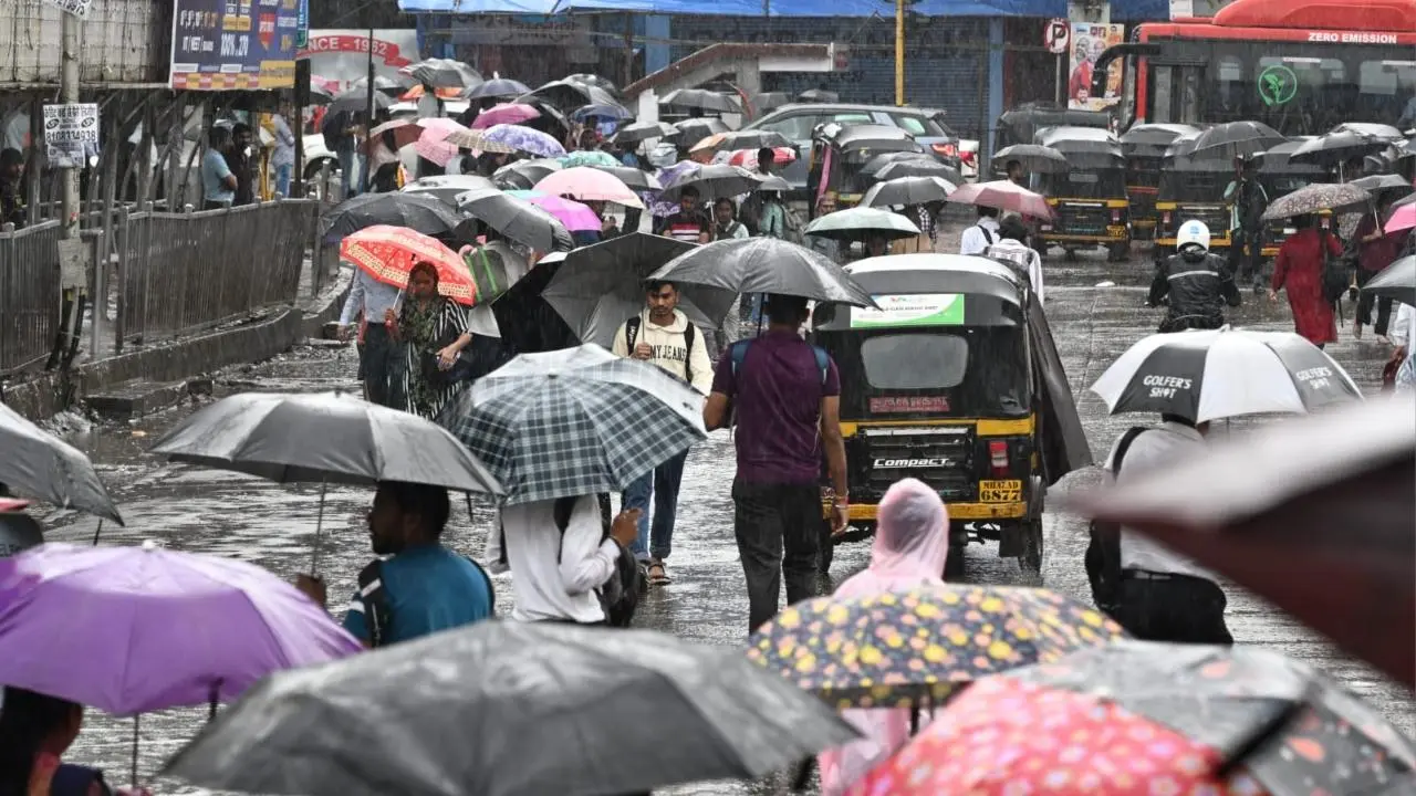 In Photos: Heavy rains lash Mumbai, traffic and trains hit