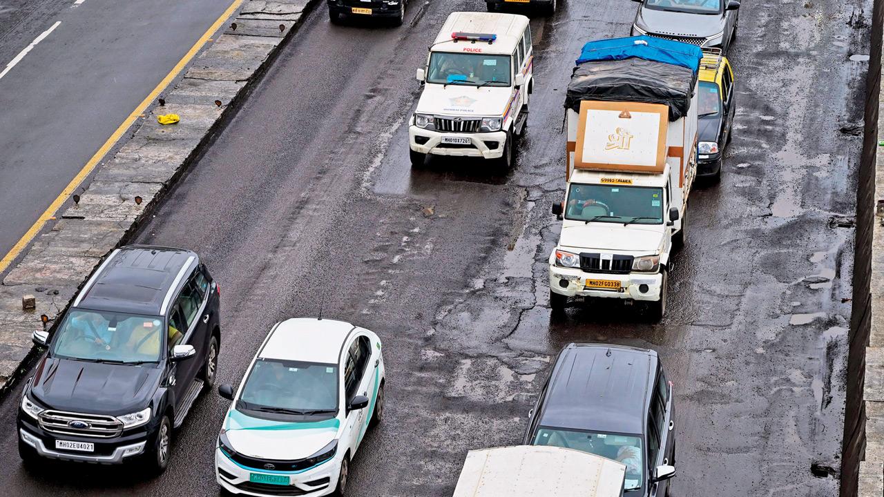 Large potholes on the Vakola flyover, Santacruz, along the Western Express Highway on August 20