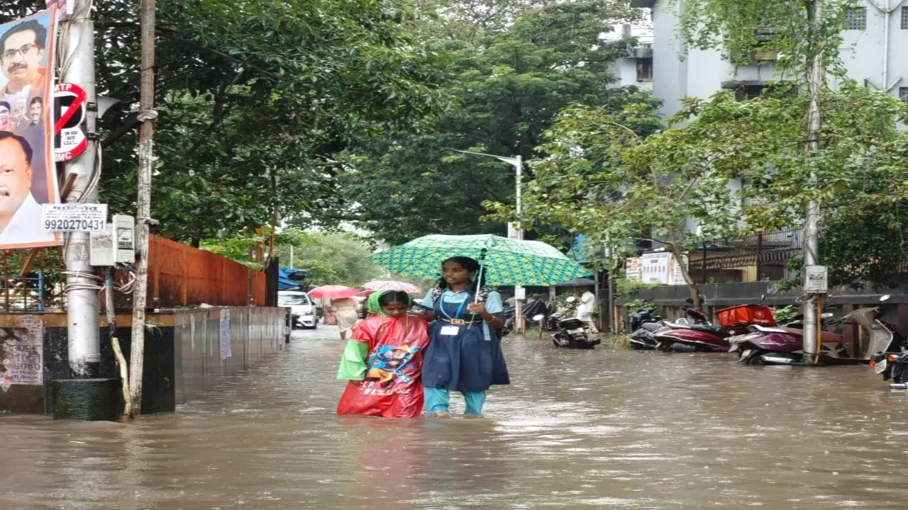 Heavy rain batters Mumbai: Waterlogged streets, traffic snarls, train delays