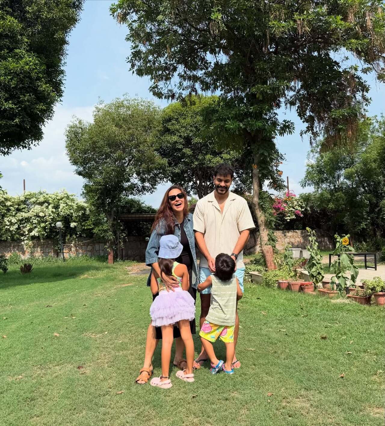 Another happy and cheerful picture from their vacation where they are seen posing together enjoying a good laugh.