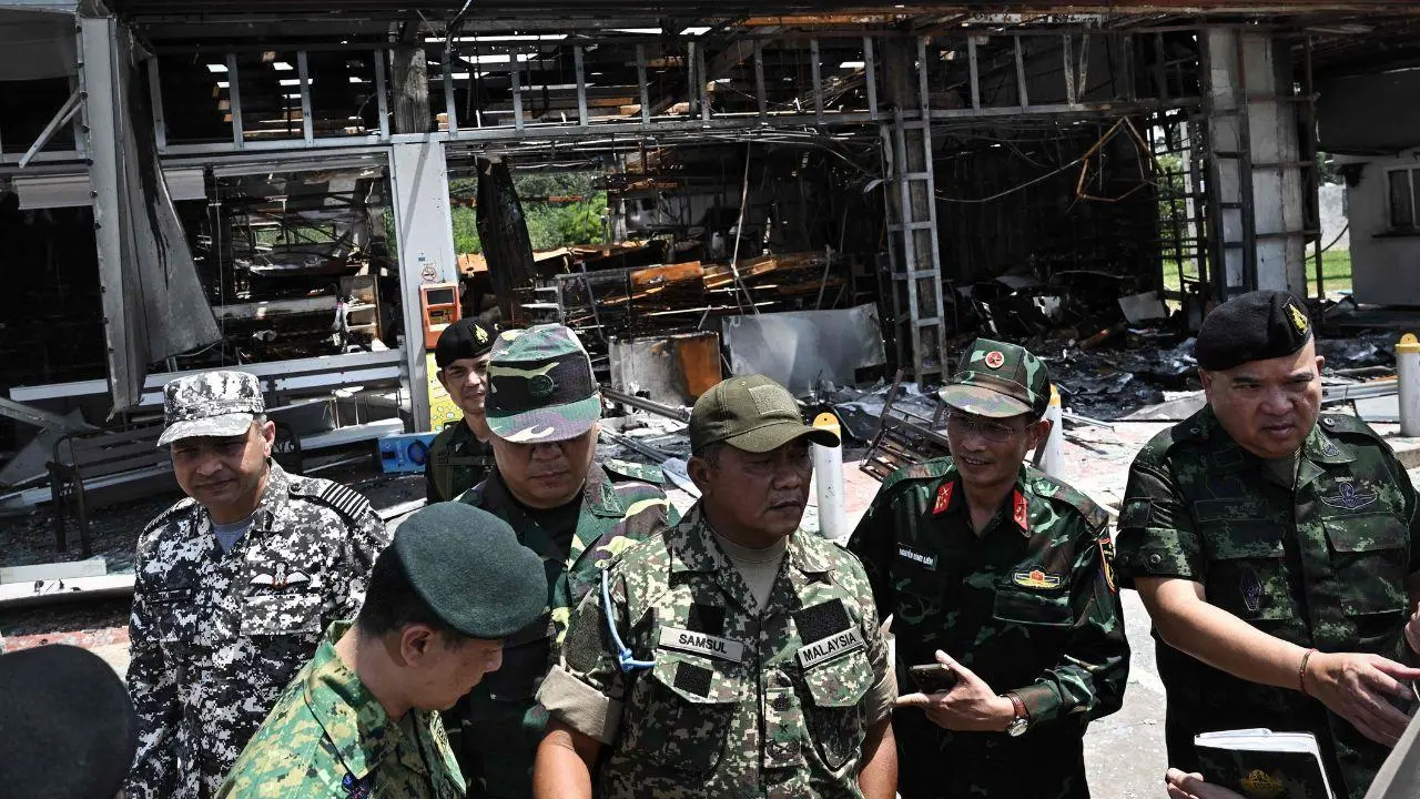 During the visit, the military attachés and diplomats surveyed a 7-Eleven convenience store at a gas station in Kantharalak town in Thailand's Sisaket province, which was struck by Cambodian artillery during the hostilities. PIC/ AFP