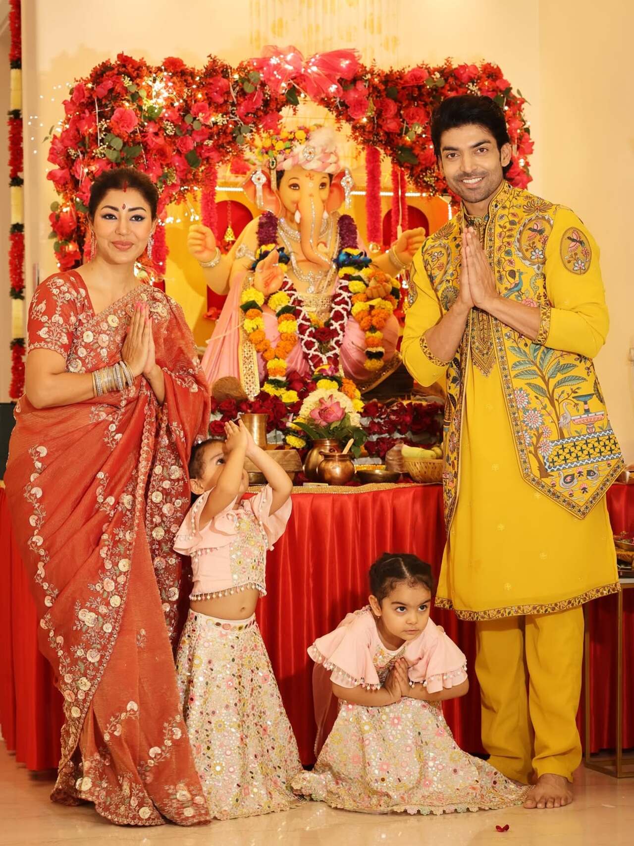Debina and Gurmeet posed with their two little angels as they welcome bappa home