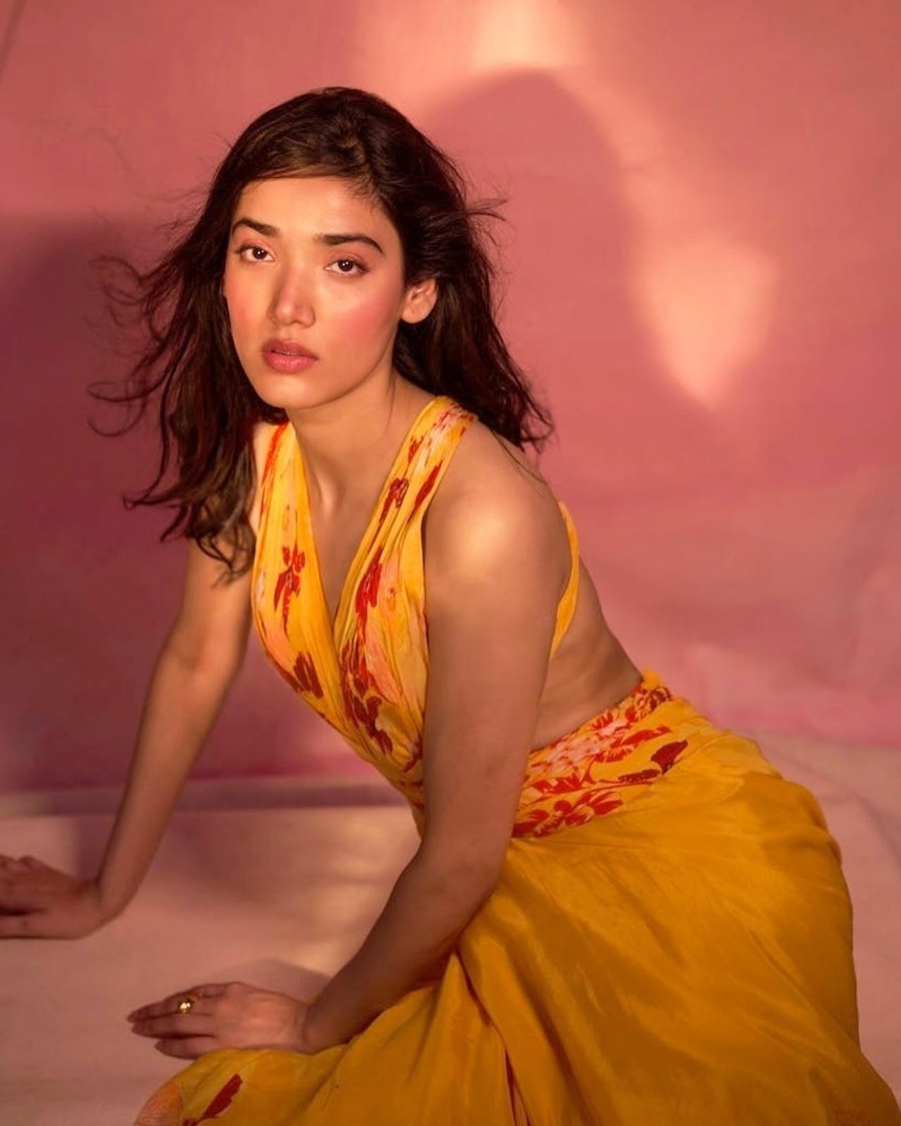 Medha Shankr looked gorgeous as ever in a yellow outfit, which has printed florals and a structured back. Her dewy makeup add to the charm of this look.