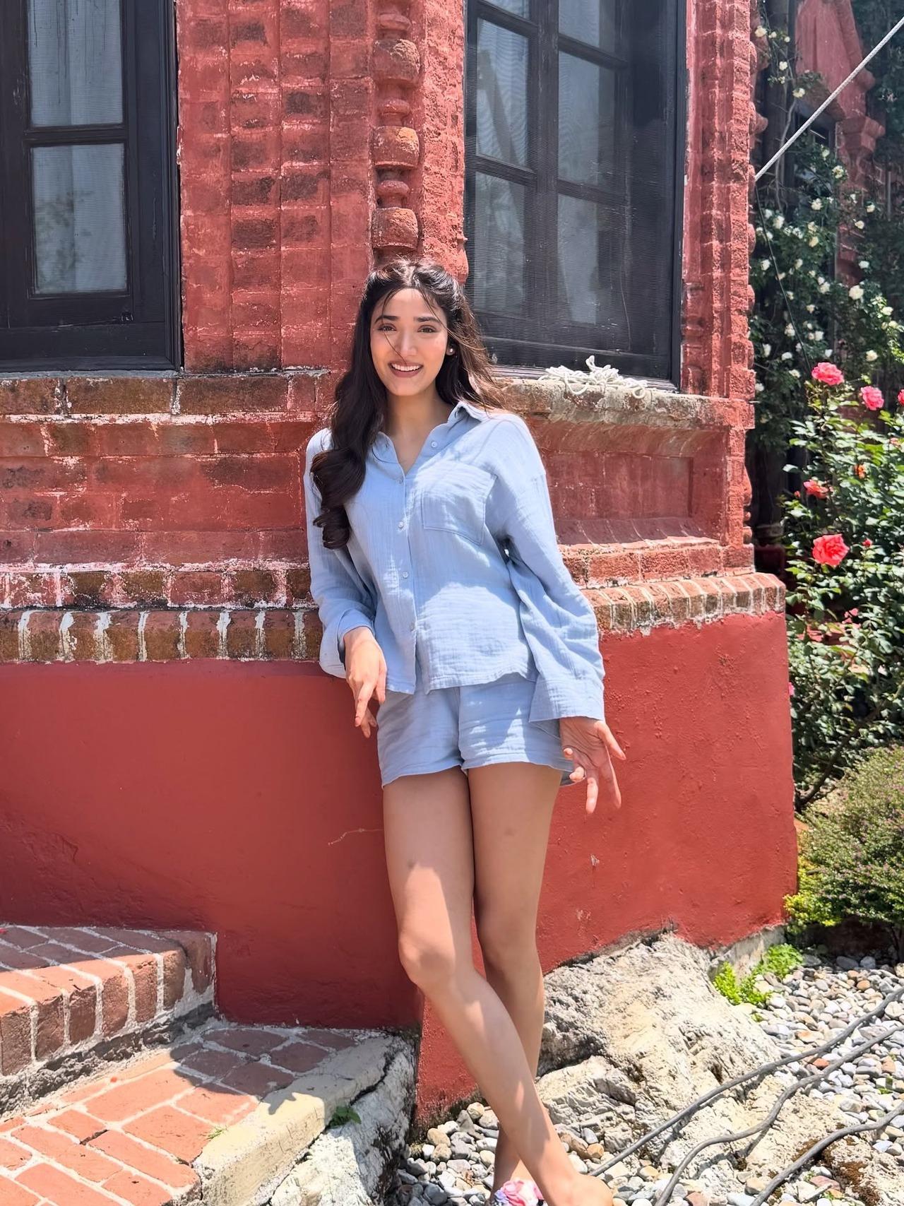 Medha keeps it easy-breezy in this casual powder blue co-ord set featuring a shirt and relaxed short pants. 