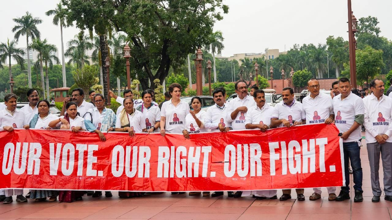 IN PHOTOS: Opposition MPs stage T-shirt protest against EC in Parliament