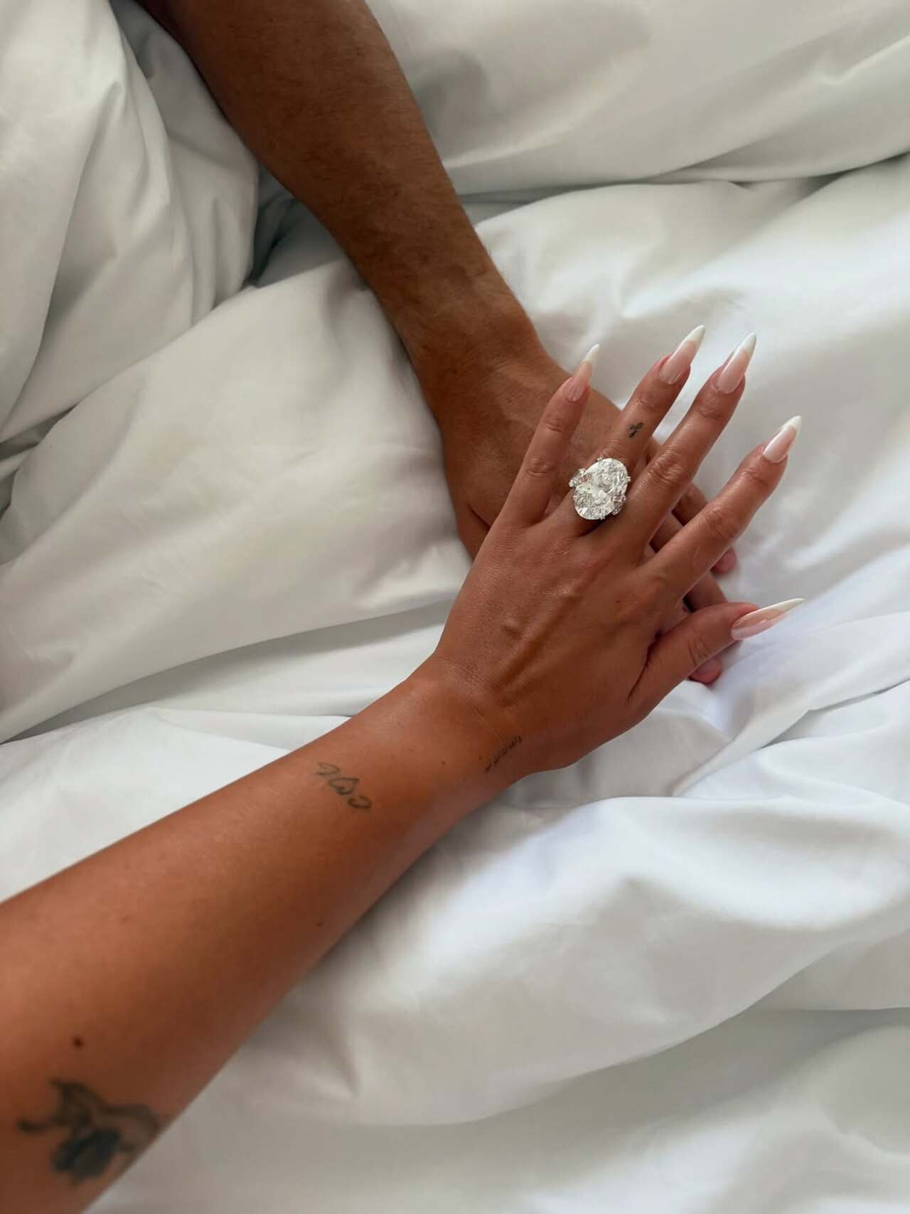 The model announced the engagement on Instagram, posting a close-up of an oval-cut diamond ring and saying, 