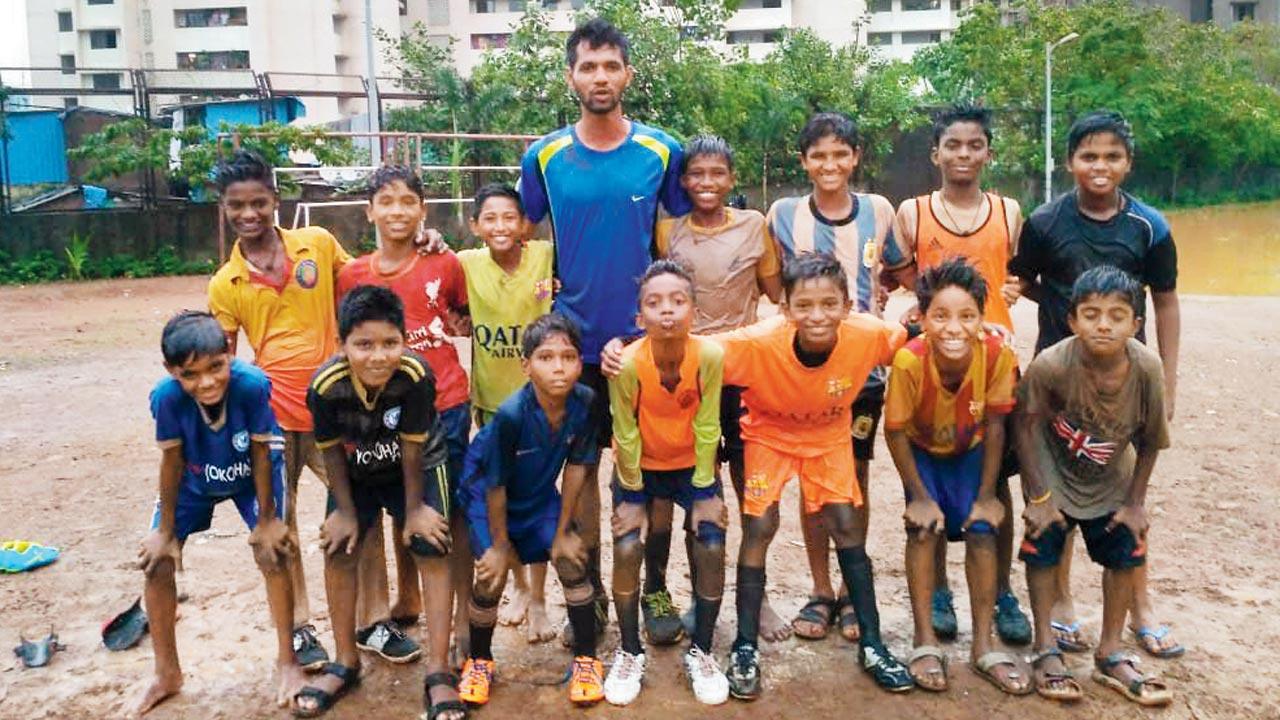 Manivarane Kounder with his team who play football under his guidance. Pic Courtesy/Mani Varane