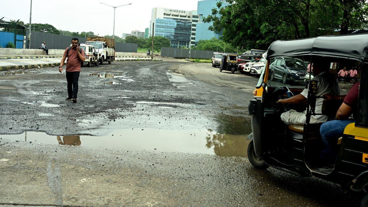 For many motorists and two-wheeler riders, these potholes pose a serious risk of skidding, accidents, and vehicle breakdowns. PIC/ KIRTI SURVE PARADE