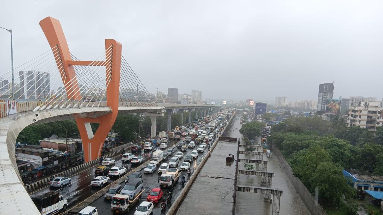 The Western Express Highway, a crucial north-south corridor connecting the city, was impacted on Tuesday after heavy downpour
