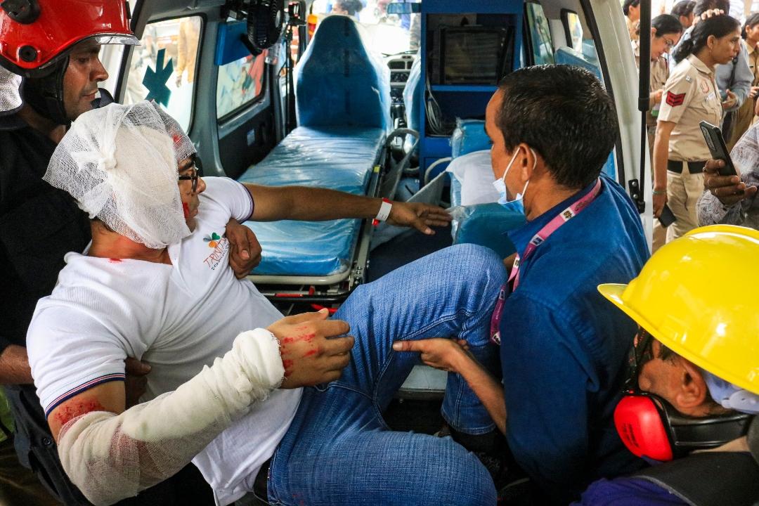 At RML Hospital, officials simulated emergency response mechanisms for potential earthquake impacts and industrial accidents. At Mother International School, participants practised cutting off gas and electricity connections upon receiving the earthquake signal, followed by rescue operations