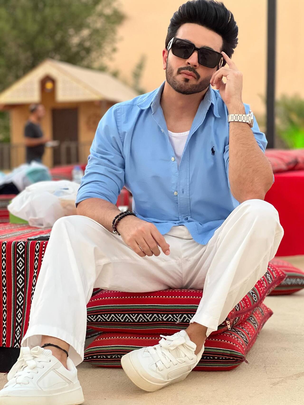 This look of Dheeraj Dhoopar perfectly balances comfort and class. The soft blue shirt paired with crisp white trousers creates a fresh, modern vibe that feels relaxed yet refined.