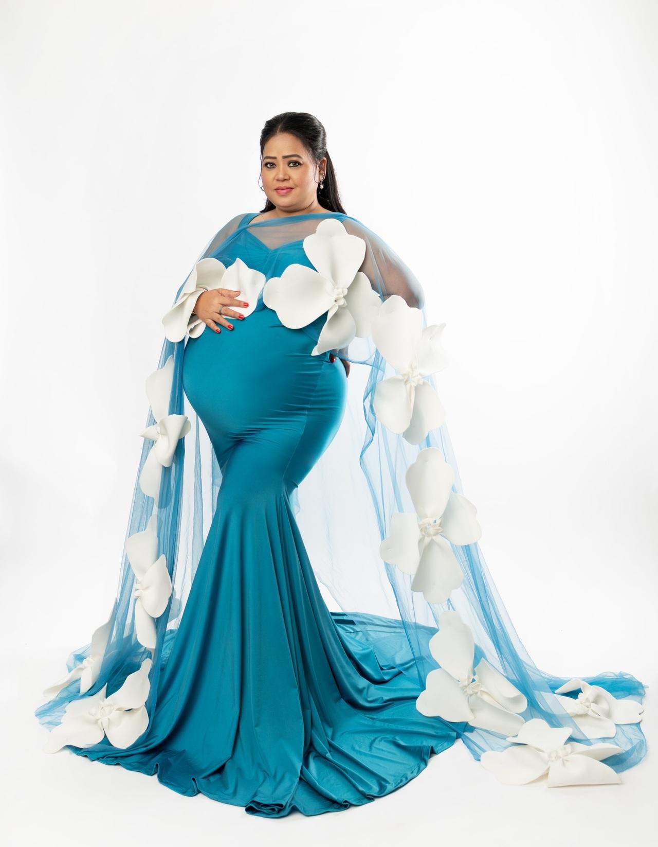<p>Bharti Singh looked gorgeous in a blue silk gown with large white floral accents over a net layer. She kept her accessories minimal, wearing only a pair of earrings, and styled her hair in a middle part with a half-up look.</p> <p>Bharti Singh looked gorgeous in a blue silk gown with large white floral accents over a net layer. She kept her accessories minimal, wearing only a pair of earrings, and styled her hair in a middle part with a half-up look.</p>