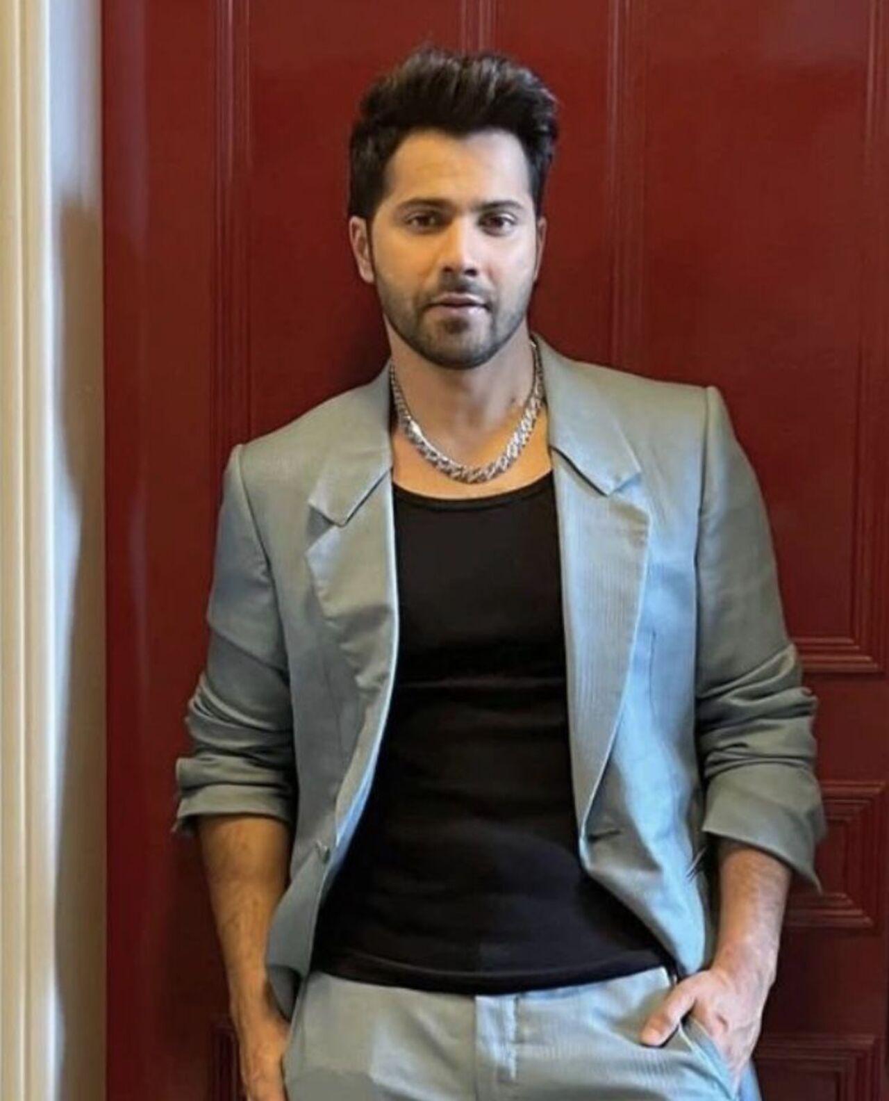 <p>Keep it semi-casual to play it safe like Varun Dhawan in this grey suit paired with a black t-shirt, ditching the traditional shirt, and rolled up sleeves.</p> <p>Keep it semi-casual to play it safe like Varun Dhawan in this grey suit paired with a black t-shirt, ditching the traditional shirt, and rolled up sleeves.</p>
