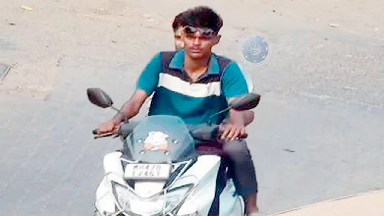 The image with the challan shows a two-wheeler rider without a helmet, not the complainant’s car. Pics/By Samiullah Khan