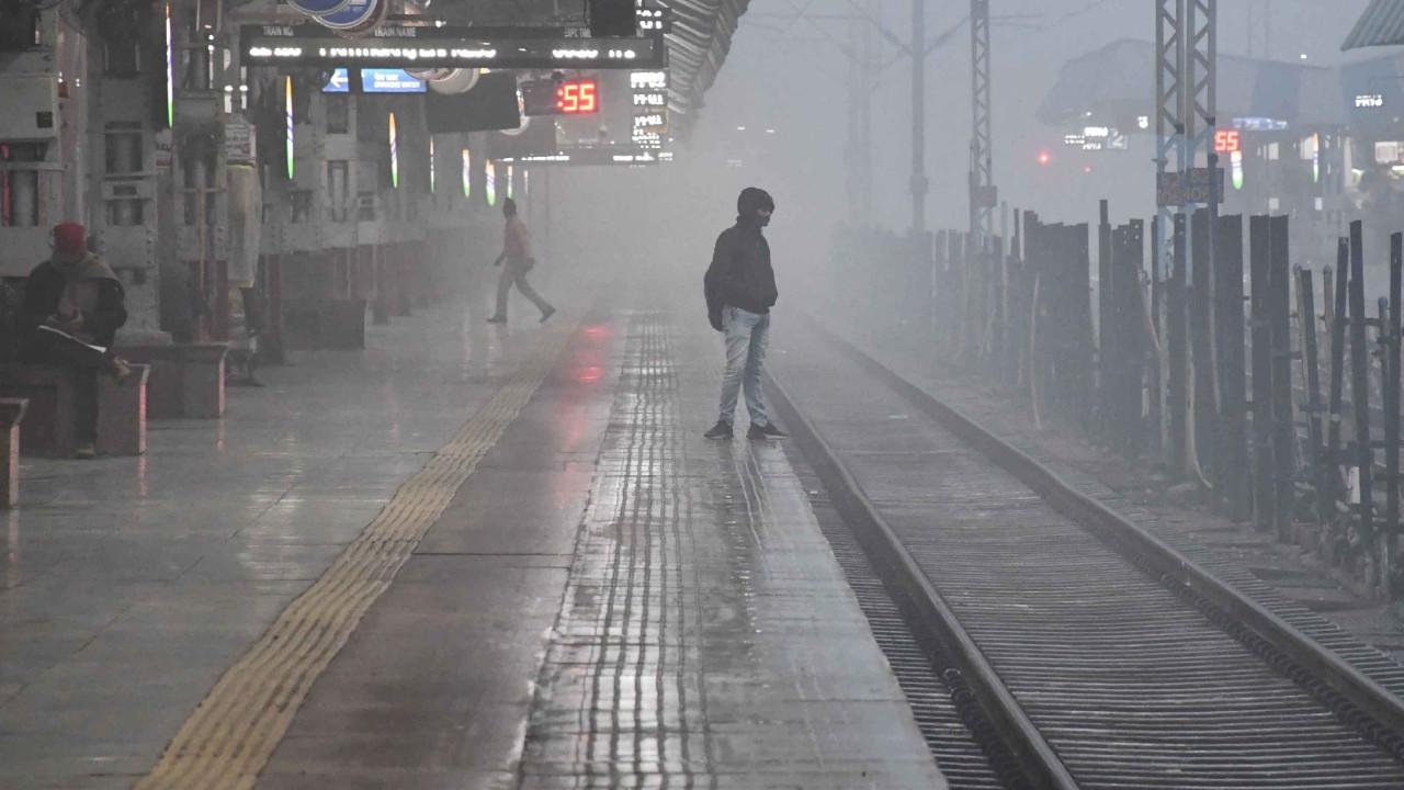 In Photos: Dense fog disrupts flights, trains across North India