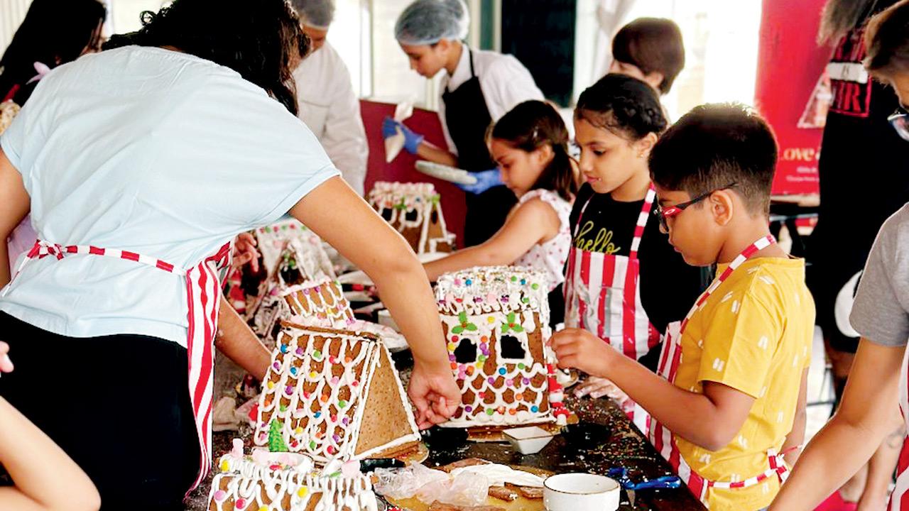 Participants decorate their houses during a previous workshop