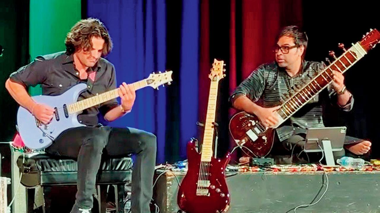 Mark Lettieri of Snarky Puppy (left) jams with Purbayan Chatterjee
