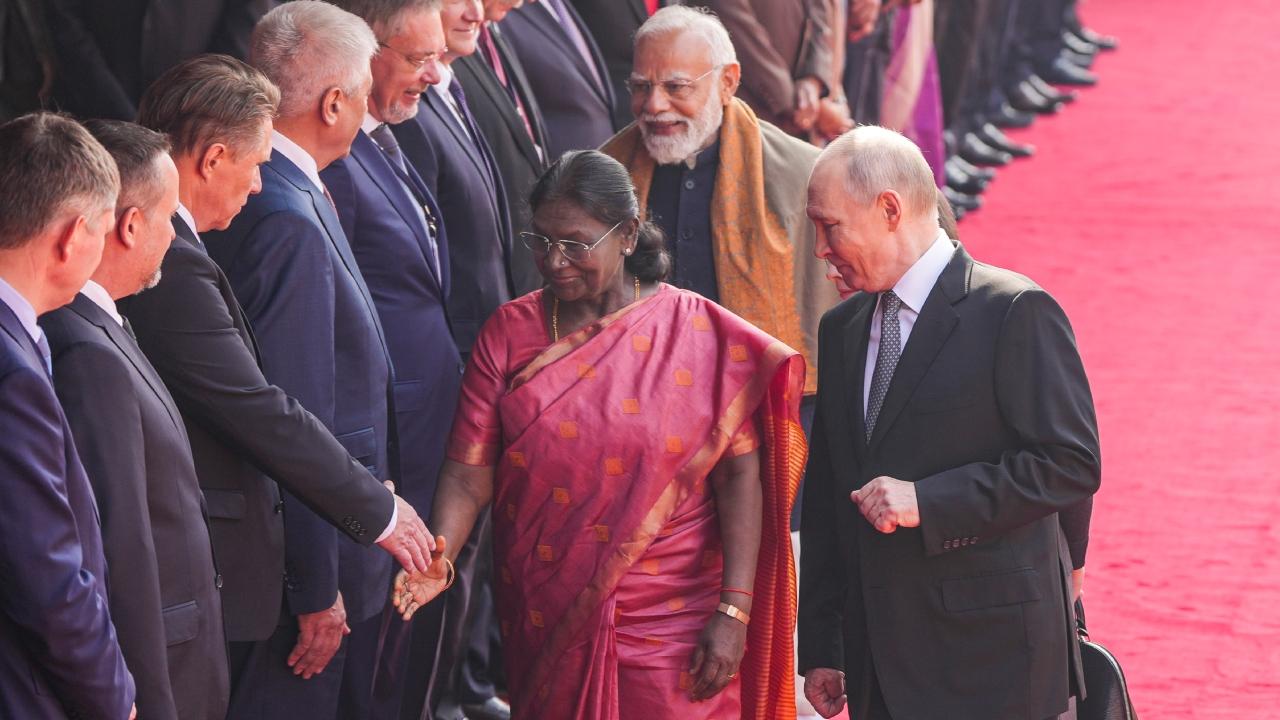 Prime Minister Modi on Thursday received Putin at New Delhi's Palam airport with a hug amid a group of artistes performing traditional dances
