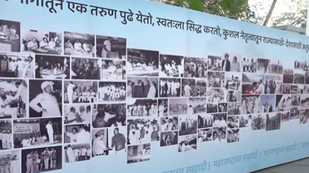 A poster full of his old, new photos was set near the centre 