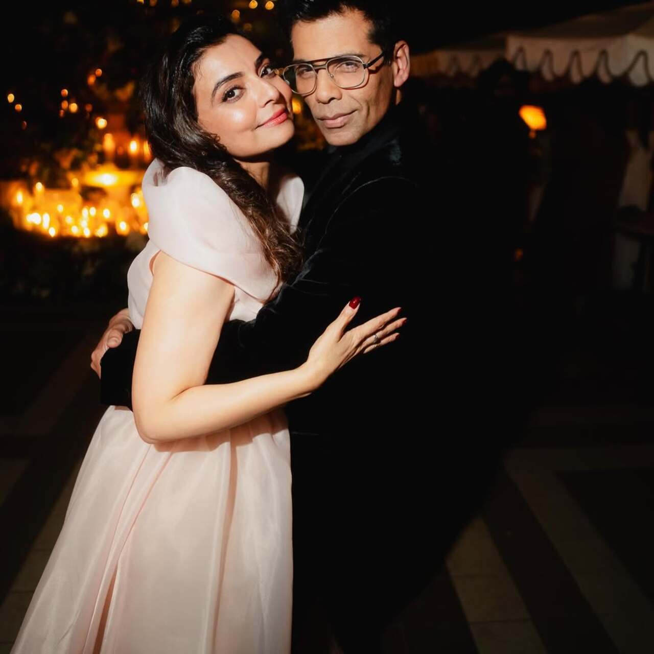 Vaibhavi strikes a stylish pose alongside Karan Johar. Their camaraderie shines through, making for a picture-perfect moment.