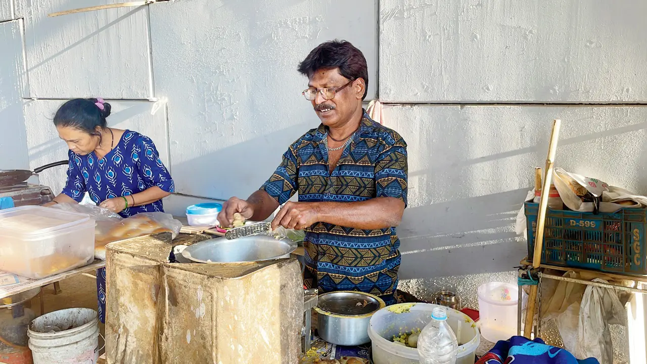 Sudesh and Nanda More at their tea and vada pav stall under the bridge, where they say the unlit stretch feels unsafe