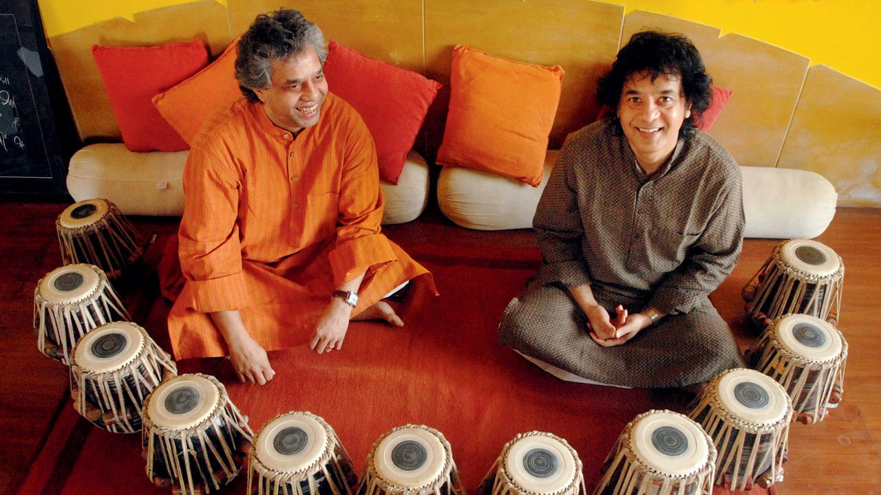 Ustads Fazal Qureshi (left) and Zakir Hussain in 2008