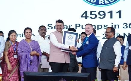 Maharashtra CM Devendra Fadnavis receiving Guinness World record certification for MSEDCL