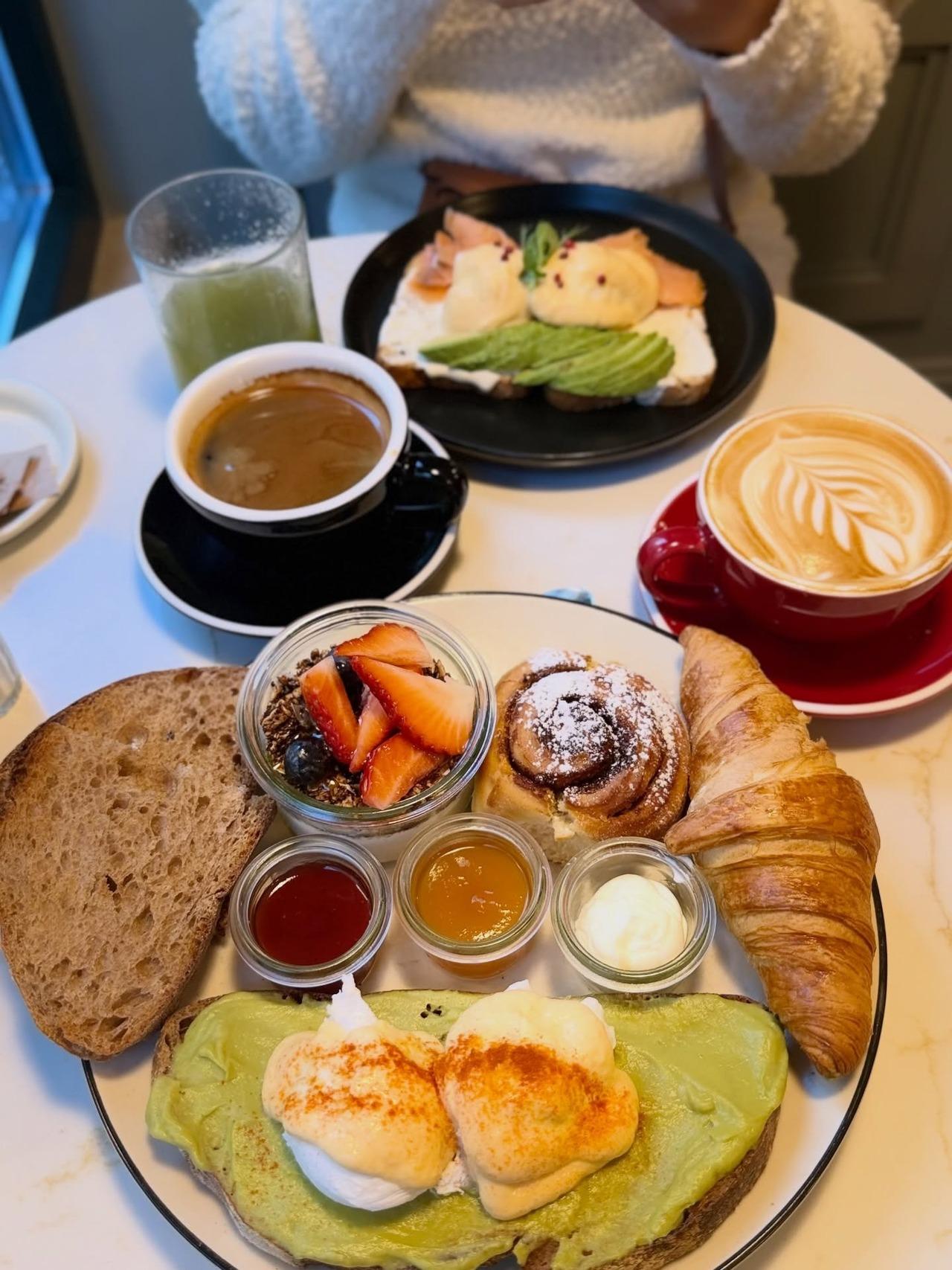 <p>The couple enjoyed scrumptious meals too. One of the pictures gave a glimpse of a mouth-watering breakfast spread complete with croissants, coffee, hot chocolate, pudding, cinnamon rolls, avocado toast and more.</p>