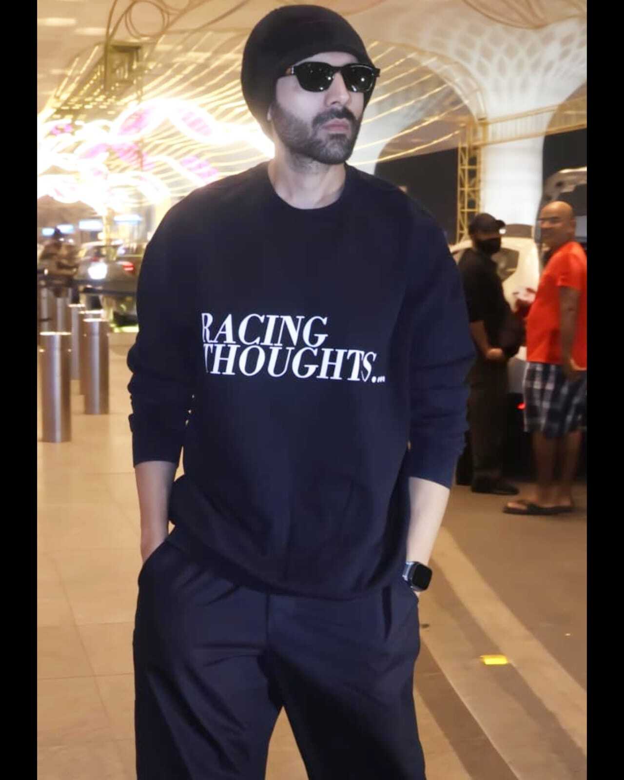 Kartik Aaryan keeps it casual for his airport look, dapper keeps his shades and beanie intact