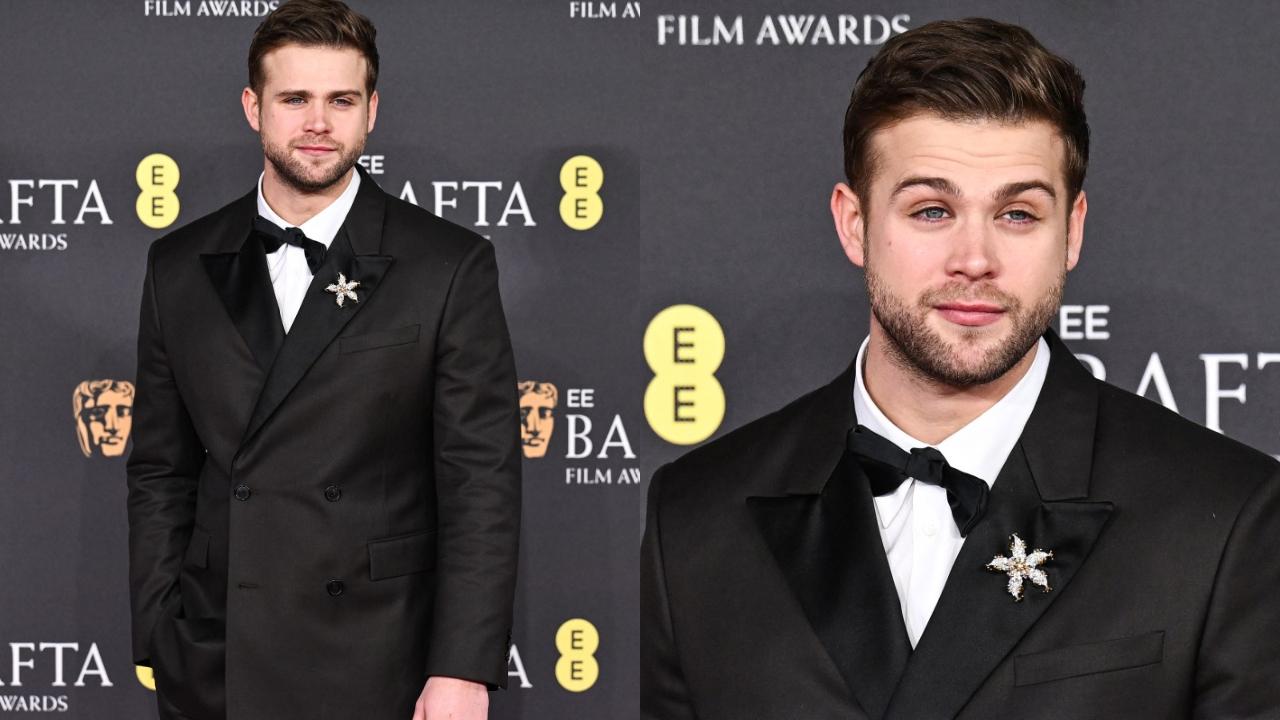 Leo Woodall also opted for the classic black suit look. However, the shiny brooch on the lapel stood out.