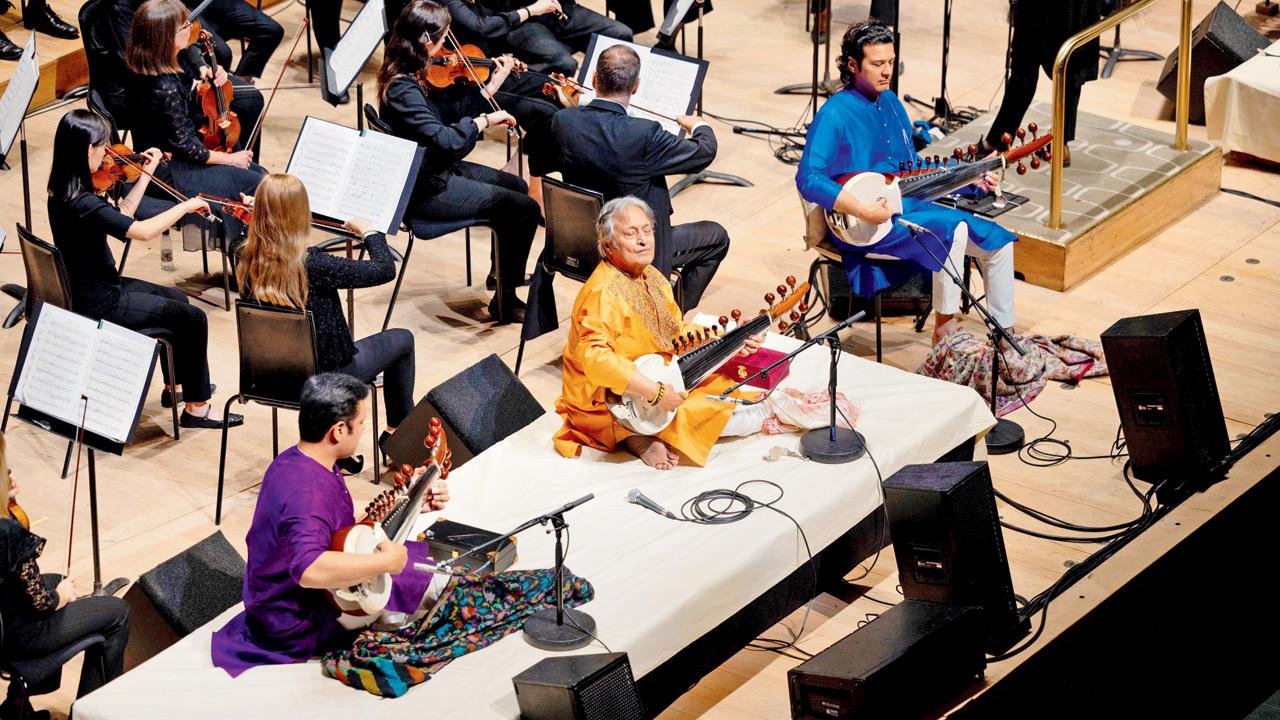 (From left) Amaan Ali Bangash, Ustad Amjad Ali Khan, Ayaan Ali Bangash at Royal Festival Hall in London. pic courtesy/London Philharmonic orchestra