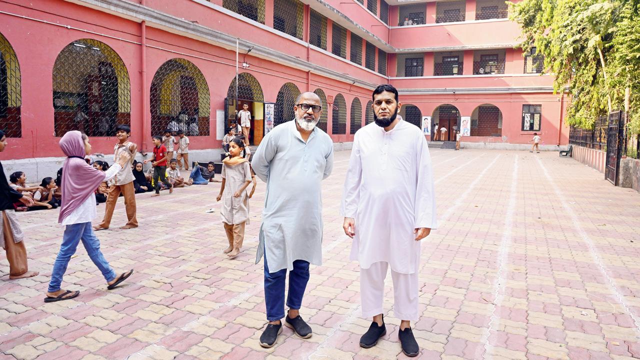 (Left) Arif Shaikh, trustee of Navtarang Charitable Trust, and activist Irfan Macchiwala on the school’s premises