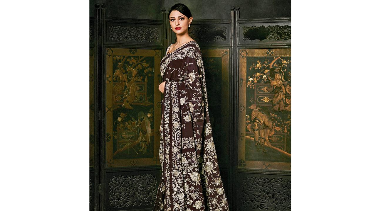 A model wears  a gara designed by  Ashdeen Lilaowala
